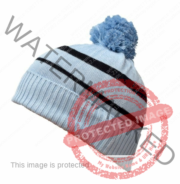 This is a photograph of Bamboo Beanie, football blue with black stripes and a pom pom available from Bamboo Creations Victoria