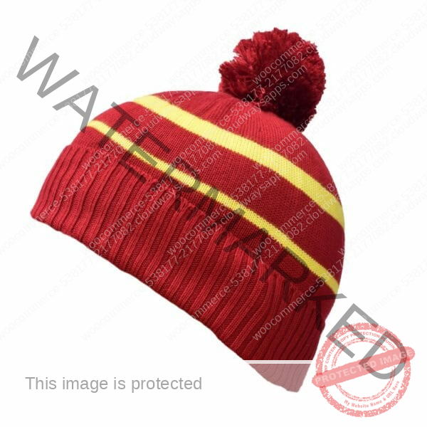 This is a photograph of Bamboo Beanie, burnt red with lemon stripes and a pom pom available from Bamboo Creations Victoria